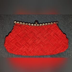 NWOT red woven clutch with large round rhinestones